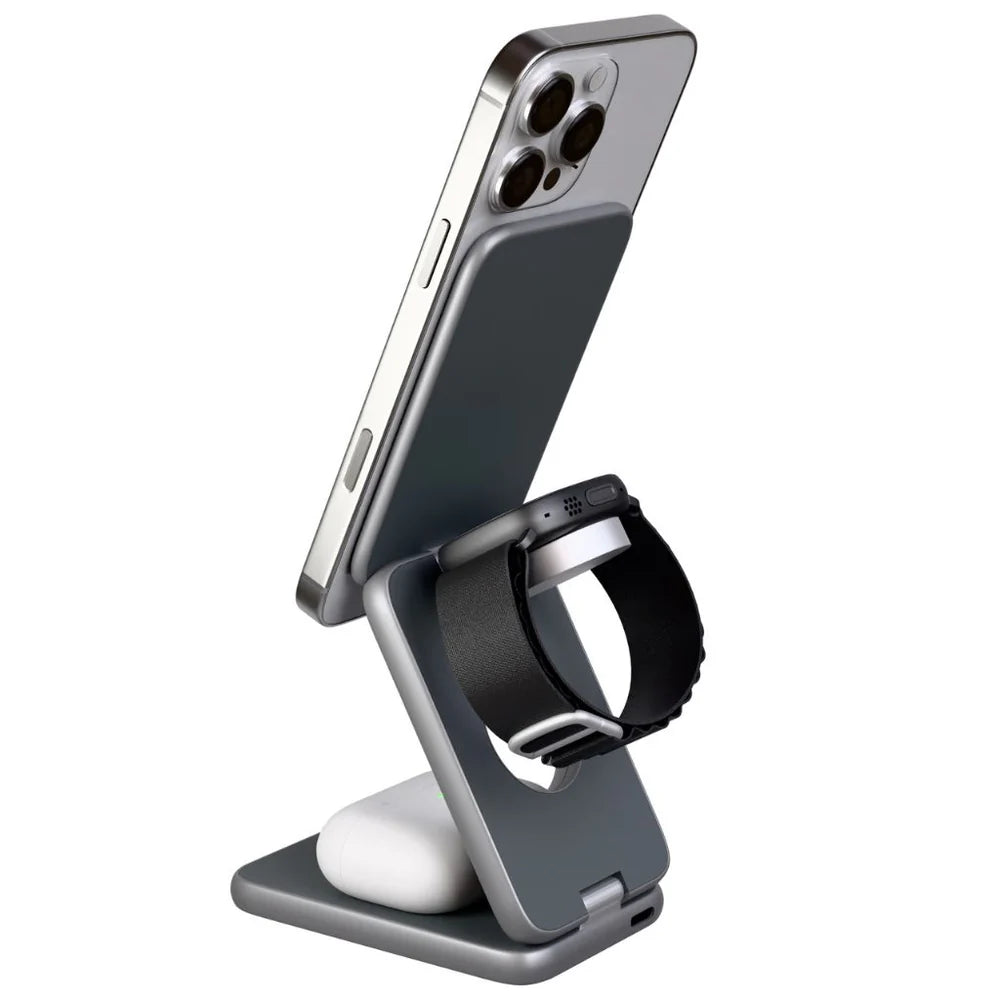 Phone, watch, and smart tag on a stand with a white background