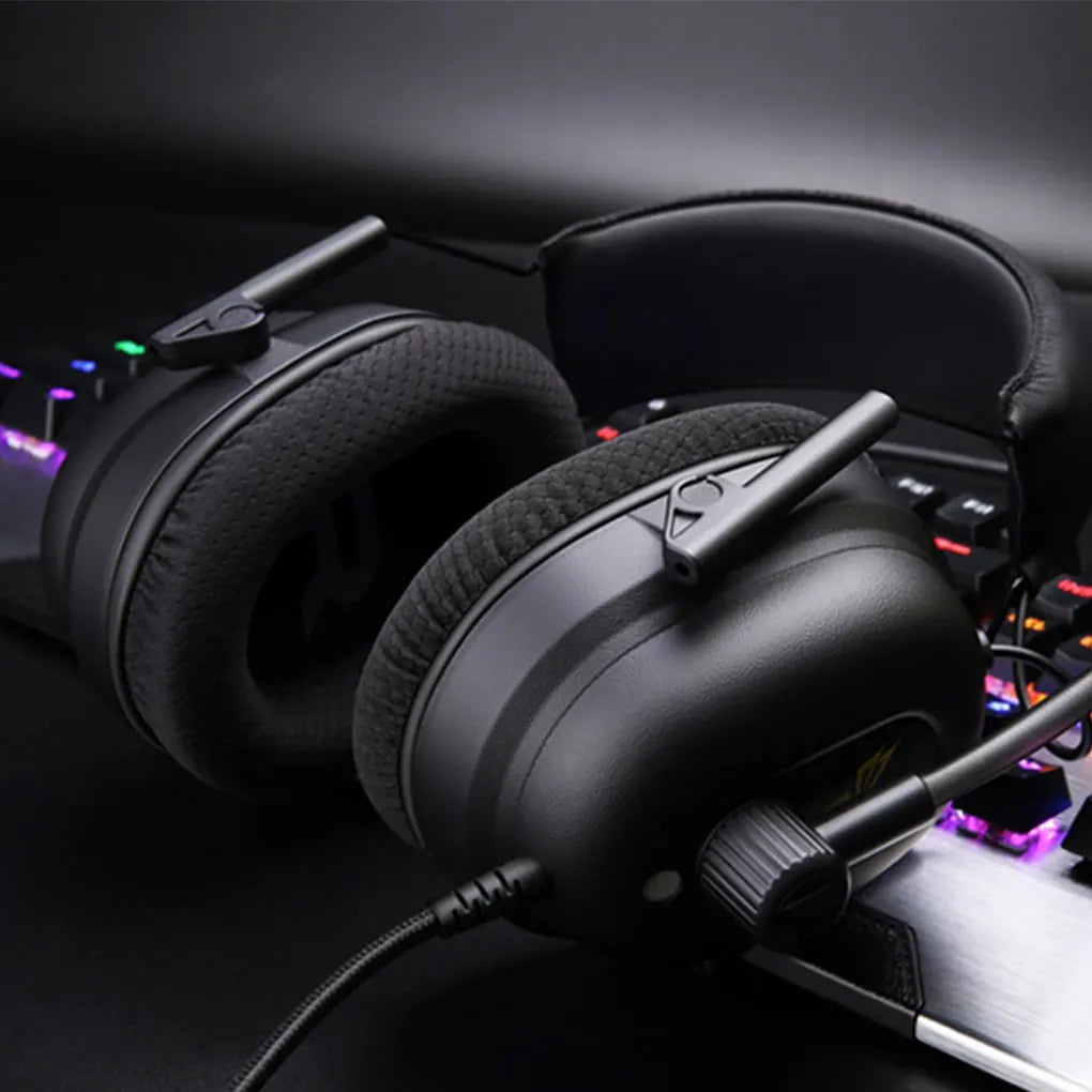 Black Commander G Series Gaming Headphones with microphone on a dark surface