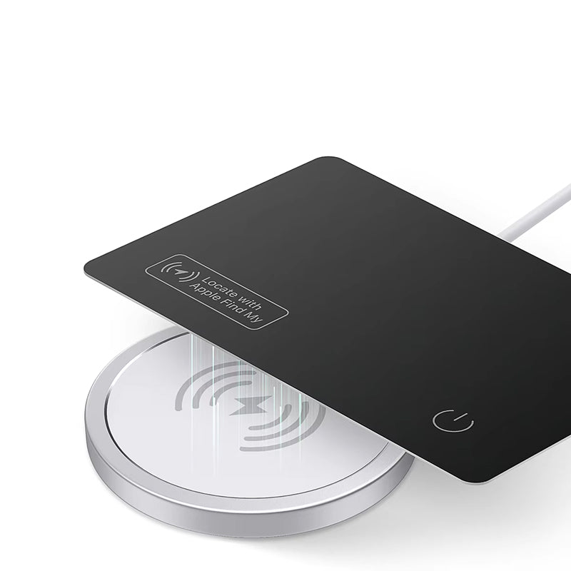Wireless charging pad with IziPock Wallet Tracker Card black top and silver base on a white background