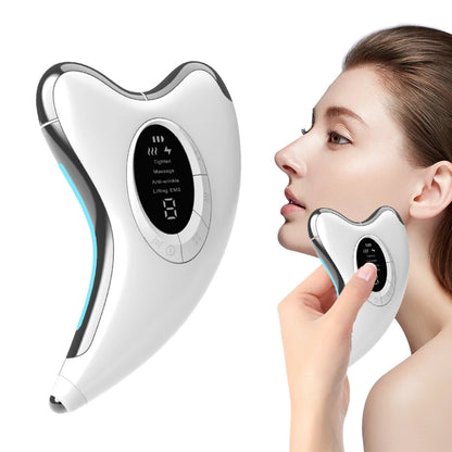 Beauty Keovy Face Massager with digital display held by a person, on a white background