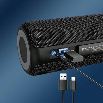 Black Meacode Portable Bluetooth Speaker with USB and microphone ports on a blue background