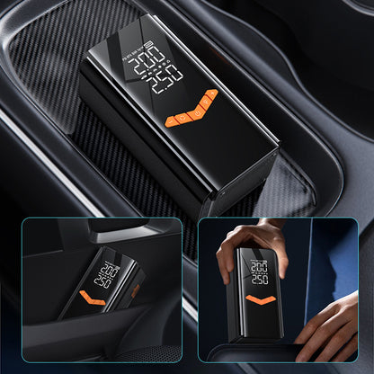Car Moxier 2 in 1 Tyre Inflator Jump Starter with digital display and temperature indicator, placed in a car's air vent.