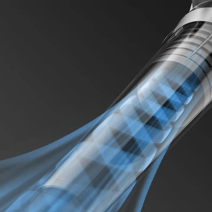 Close-up of a futuristic, metallic object with blue light on a dark background