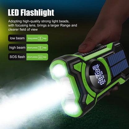 Green SigziVox Emergency Radio LED flashlight with solar panel and digital display, held by a hand in a dark setting.