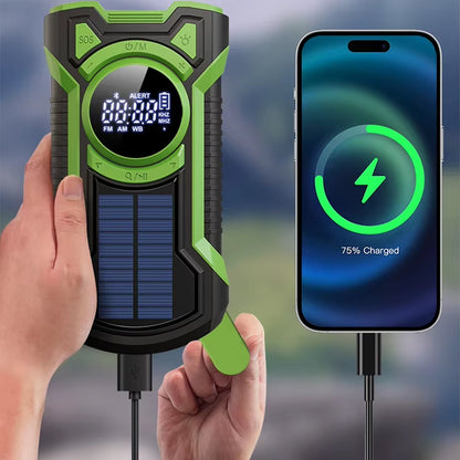 Hand holding a green and black SigziVox Emergency Radio device with a smartphone showing charging progress.