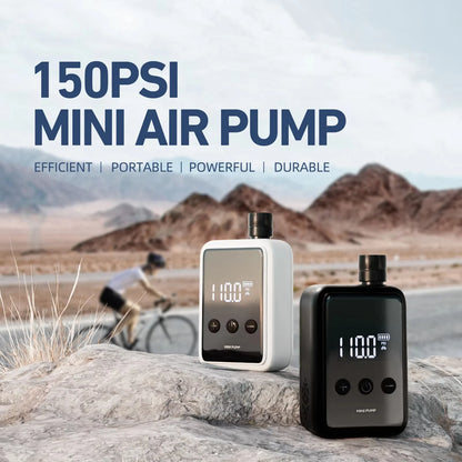 Two mini Tyrisclix Bike Pump on a rock with a desert landscape and cyclist in the background, featuring text about the air pumps' features.