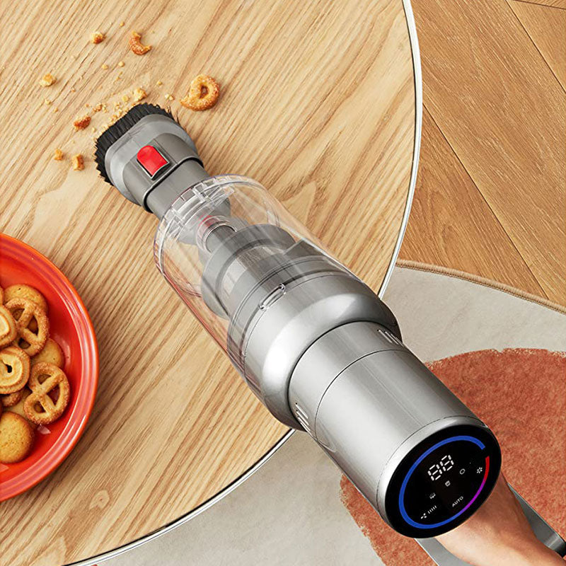 drexen vacuum cleaner on a wooden floor with food debris