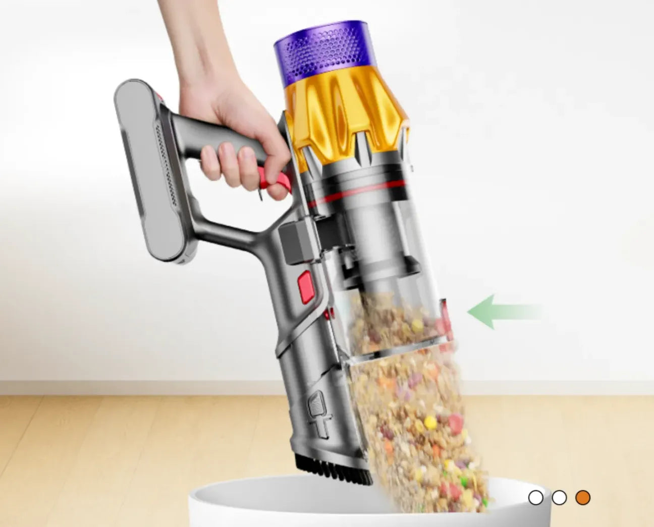 Hand holding a cordless ValoClean Vacuum Cleaner with a clear container filled with colorful items on a white background.