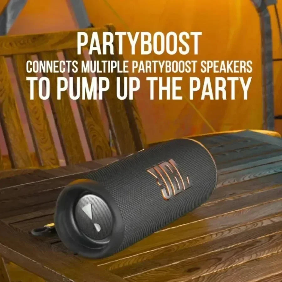 JBL Flip 6 Bluetooth speaker connected to multiple PartyBoost-compatible JBL speakers for synchronized audio and louder sound at parties or events
