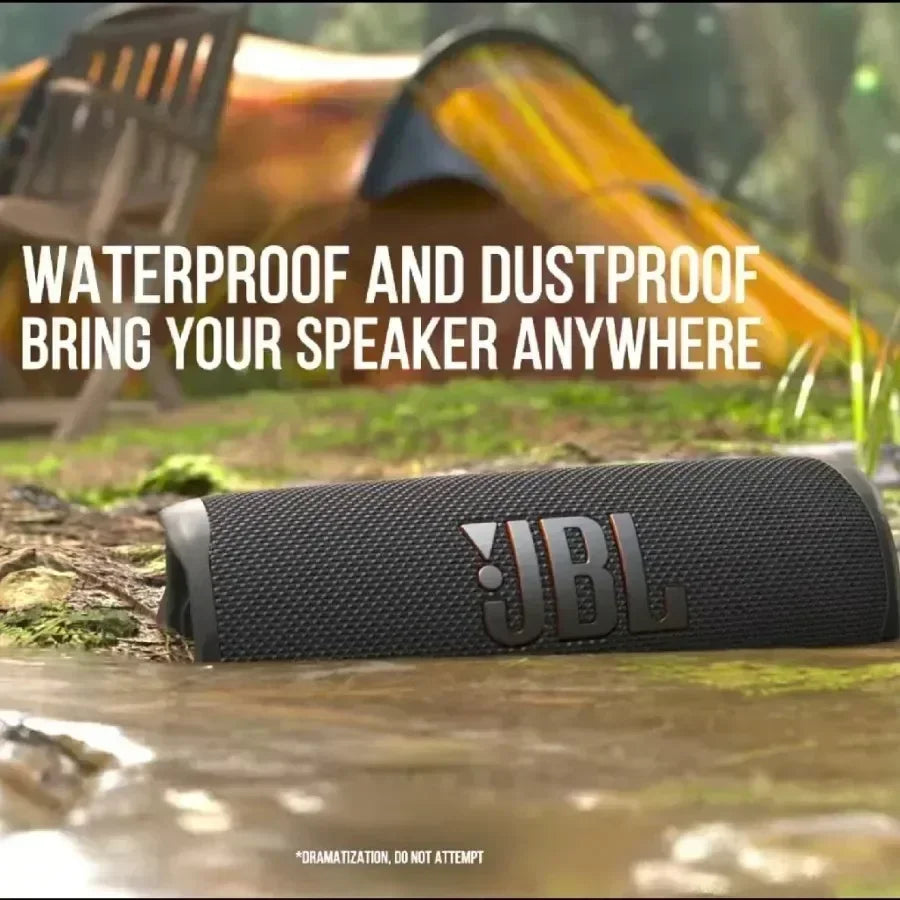 JBL Flip 6 Bluetooth speaker with IP67 waterproof and dustproof rating, built to withstand rain, spills, sand, and outdoor conditions
