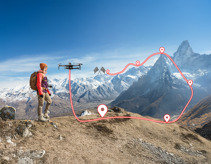 Person with a Vassco GPS Drone on a mountain top with a route marked on a clear day